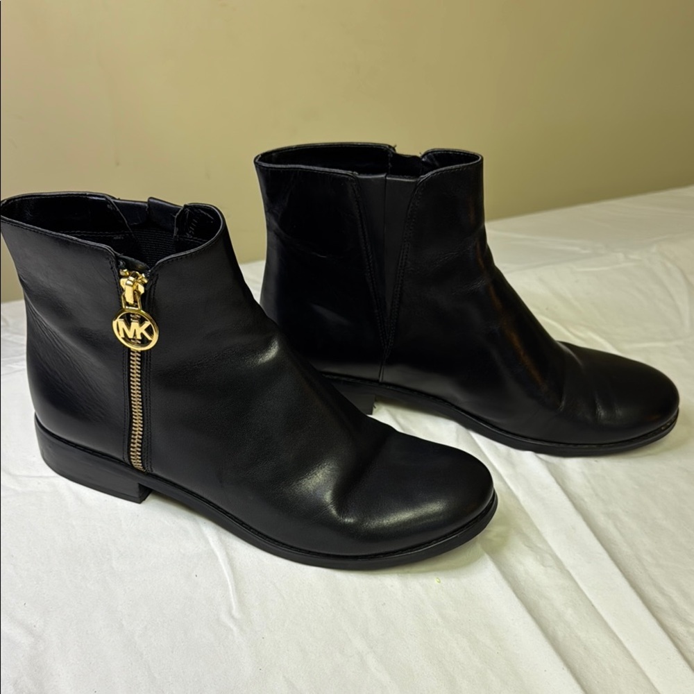Michael Kors Black and Gold Ankle Booties with Streamlined Silhouette - Picture 4 of 11